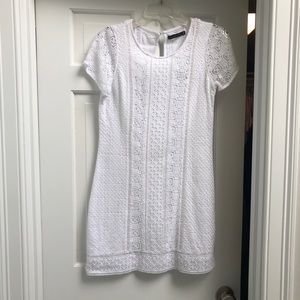 Ladies or young women’s beautiful white graduation dress. XS